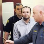 Ernesto Lee Rivas, center, is led into Skagit County District Court by Skagit County sheriff&rsquo;s deputies for his first court appearance in Mount Vernon on Friday. (Brandy Shreve/Skagit Valley Herald via AP)