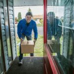 Jaireme Barrow poses for a photo in Tacoma. A box on the man&rsquo;s porch sets off a 12-gauge shotgun blank when pulled by would-be thieves. (Dean J. Koepfler/The News Tribune via AP)