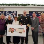 From left are Sequim-Dungeness Hospital Guild President Jean Janis, Sequim-Dungeness Hospital Guild Secretary Jan Keithly and thrift shop board Secretary Connie Hixson, presenting a $17,039 check to Fire District 3 Chief Ben Andrews, Fire Commissioner James Barnfather and Fire District 3 secretary Pattie Williams.