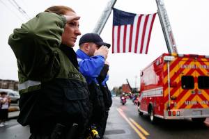 Police: Marksman killed gunman after child ran to porch