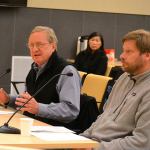 Steve Tharinger, left, and Mike Chapman, state representatives for the 24th District, speak with the Sequim City Council on Monday about the city&rsquo;s legislative priorities, which include funding the Simdars Interchange and reforming public information requests. (Matthew Nash/Olympic Peninsula News Group)