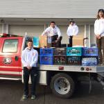 Leonard Horst                                Explorer Post 1003 members, from left, Michael Larsen, Tyler Smith, Christian Goodrich and Curtis Beery stand with the community&rsquo;s donation of about 1,200 pounds of food.                                Santa&rsquo;s Toy and Food Fire Brigade collected about 1,200 pounds of food and $600 for the Sequim Food Bank.