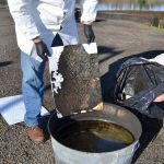 These absorbent pads measure how much oil is left over after it&rsquo;s burned using a wood product scientists created with wood shavings. Their goal is to burn at least 90 percent of the oil of the water. (Matthew Nash/Olympic Peninsula News Group)