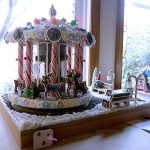 A merry-go-round themed gingerbread house submitted this year rotates, plays music and lights up. (Cydney McFarland/Peninsula Daily News)