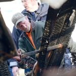 Tom Bellis looks over the remains of his home that burned New Year&rsquo;s Day. (Jesse Major/Peninsula Daily News)