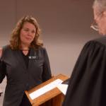 Kate Dean is sworn as as a Jefferson County commissioner for District 1 by newly sworn in Superior Court Judge Keith Harper before her first county commissioner meeting Tuesday. (Cydney McFarland/Peninsula Daily News)
