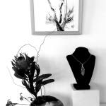 A necklace made by Kathy Schreiner, displayed on the bust at right, will be available for viewing during First Friday Art Walk in Sequim.