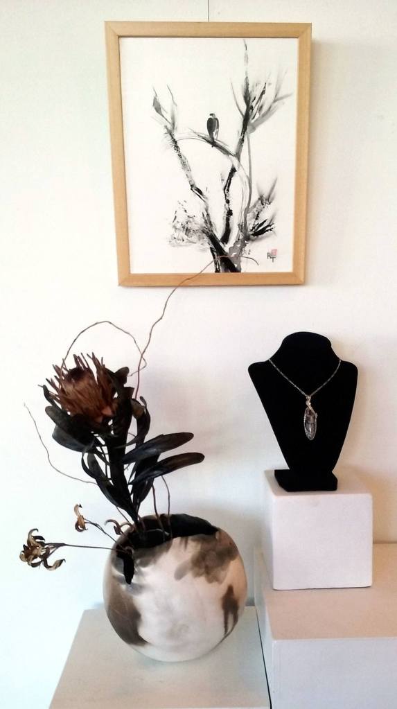 A necklace made by Kathy Schreiner, displayed on the bust at right, will be available for viewing during First Friday Art Walk in Sequim.