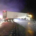Tractor-trailer wrecks on icy road near Elwha River bridge