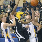 Keith Thorpe/Peninsula Daily News                                In a scramble under the hoop, from left to right, Peter Johnson of Crescent, Jamari Signor of Clallam Bay, Wyatt McNeece of Crescent and Ryan McCoy of Clallam Bay fight for a rebound.                                Keith Thorpe/Peninsula Daily News In a scramble under the hoop, Peter Johnson of Crescent, Jamari Signor of Clallam Bay, Wyatt McNeece of Crescent and Ryan McCoy of Clallam Bay fight for a rebound in the second quarter on friday at Crescent High School in Joyce.