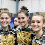 Dave Logan/for the Peninsula Daily News                                The Port Angeles gymnastics team seniors enjoy their home meet Monday. From left are Nikaila Price, Maya Wharton, and Laura Rooney.