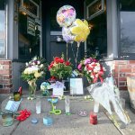 A memorial for Clint Darrow, who was shot and killed in his Port Angeles home last week, continued to grow at Van Goes Gourmet Pizza & Mexican eatery on Monday. (Jesse Major/Peninsula Daily News)