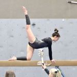 Port Angeles&rsquo; Maya Wharton competes on the beam during the Roughriders&rsquo; Friday meet against Kingston in Poulsbo.
