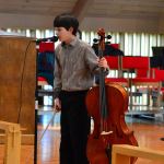 Adlai Erickson, 11, a winner of Saturday&rsquo;s Young Artist Competition, introduces himself to the judges at Holy Trinity Lutheran Church in Port Angeles.