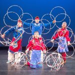 Living Legends dancers position the hoops to honor the creations of Mother Earth. Joel Fonoimoana, Shanoah Ulibarri, Erin Tapahe and Kamalu Kaluhiokalani, from left, create symbols of the eagle, the basket, and the world. (Mark A. Philbrick/BYU)