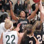 Keith Thorpe/Peninsula Daily News Sequim&rsquo;s Adrienne Haggerty, top, pulls down a rebound in the fourth quarter on Friday while surrounded by, from left, Nizhoni Wheeler and Natalie Steinman of Port Angeles and teammates Bobbi Sparks and Madison Green.