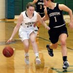 Keith Thorpe/Peninsula Daily News Port Angeles&rsquo; Lauren Lunt drives down court with Sequim&rsquo;s Hope Glasser in second-quarter play on Friday. Following behind is Sequim&rsquo;s Bobbi Sparks.