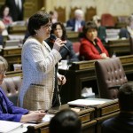 Rep. Kristine Lytton, D-Anacortes, speaks on the state House floor on Monday at the Capitol in Olympia. (Ted S. Warren/The Associated Press)