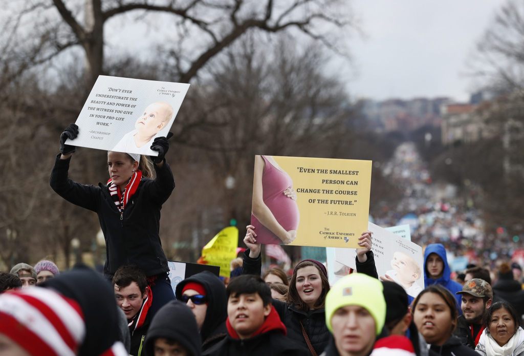 Anti-abortion activists march up Constitution Avenue en route to the Supreme Court in Washington, D.C., on Friday during the 44th annual March for Life. (Carolyn Kaster/The Associated Press)