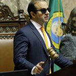 Lt. Gov. Syrus Habib bangs the gavel as he presides over the Senate on Friday in Olympia.(AP Photo/Ted S. Warren)