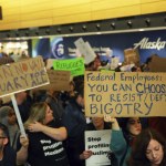 More than 1,000 people gather Saturday at Seattle-Tacoma International Airport to protest President Donald Trump&rsquo;s order that restricts immigration to the U.S. (Genna Martin/seattlepi.com via AP)