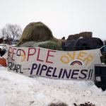 Hay is stacked up to feed horses at a protest encampment along the route of the Dakota Access oil pipeline near Cannon Ball in southern North Dakota on Tuesday. (James MacPherson/The Associated Press)