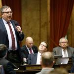 Rep. Mike Volz, R-Spokane, speaks on the state House floor Monday at the Capitol in Olympia. (Ted S. Warren/The Associated Press)