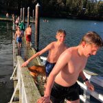 Brave people of all ages took on the new year with a swim off Marrowstone Island in the annual polar plunge on Sunday. (Cydney McFarland/Peninsula Daily News)