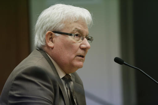 Jerry Bender, of the Association of Washington School Principals, speaks during a Senate hearing at the Capitol on Thursday in Olympia. (Ted S. Warren/The Associated Press)