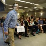 Jaxon Owens, 17, left, editor-in-chief of the Viking Vanguard student newspaper at Puyallup High School, walks to speak during a Senate hearing at the Capitol on Thursday in Olympia. (Ted S. Warren/The Associated Press)