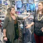 Denise Arey of Expressions in downtown Port Townsend speaks to Rebekah Fessenden, who will be speaking to local business owners later this week on how store design can affect sales. (Cydney McFarland/Peninsula Daily News)