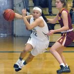 Keith Thorpe/Peninsula Daily News Port Angeles&rsquo; Cheyenne Wheeler, left, sweep around the defense of Kingston&rsquo;s Avy Hiner in the first quarter of the Roughriders&rsquo; 33-27 victory over the Buccaneers.