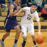Keith Thorpe/Peninsula Daily News Port Angeles&rsquo; Luke Angevine, right, and his Port Angeles teammates will begin their Districts postseason run with a game Wednesday against White River at Woodrow Wilson High School in Tacoma.