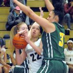 Keith Thorpe/Peninsula Daily News Peninsula&rsquo;s Tiffani Smith, center, squeezes between the defense of Shoreline&rsquo;s Kassidy Alexander, left, and Zolviz Keilani in the closing minutes of their Wednesday night matchup played at Port Angeles High School.