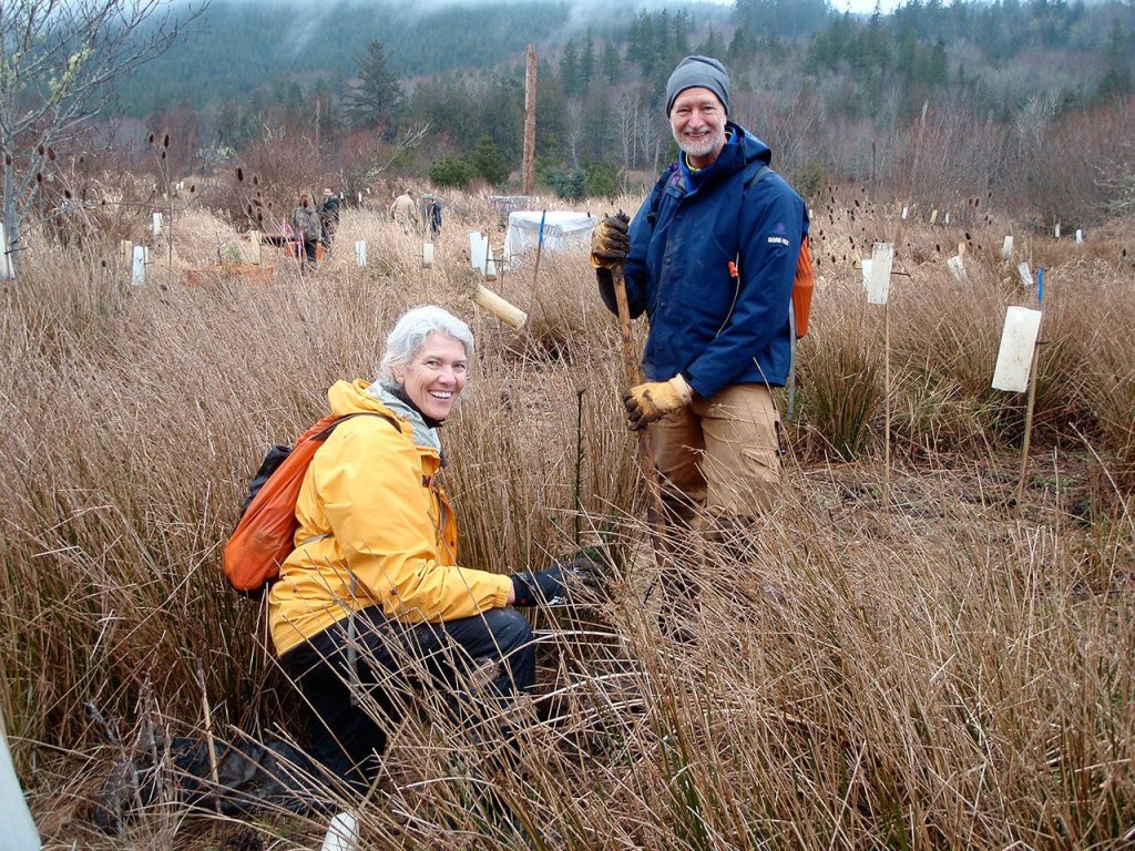 Volunteer Charlie Kaneski and Northwest Watershed Institute board member Liz Hoenig-Kaneski helping out at the event.
