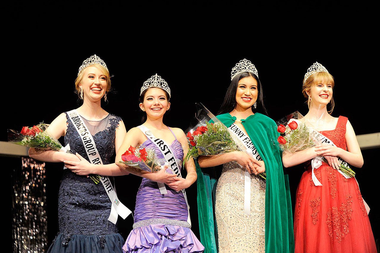 The 2017 Sequim Irrigation Festival royalty includes, from left, Princess Abby Norman, Princess Emily Straling, Queen Karla Najera and Princess Alison Cobb. They were selected from seven contestants Saturday in the Sequim High School auditorium. This year&rsquo;s festival, &ldquo;122 Skies of Blue,&rdquo; runs May 5-14. (Matthew Nash/Olympic Peninsula News Group)