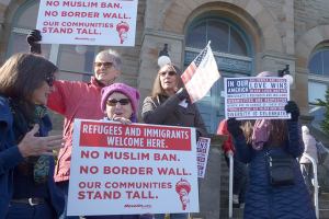 Dozens gather in Port Townsend for protest against raids, deportation