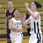 Keith Thorpe/Peninsula Daily News                                Clallam Bay&rsquo;s Mariah LaChester, front left, and Molly McCoy, right, chase after a loose ball as Lopez Island&rsquo;s Zoe Reinmuth looks on during the Bruins&rsquo; Class 1B Tri-District Tournament win at Port Angeles High School.