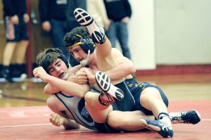 Lonnie Archibald/for Peninsula Daily News Forks&rsquo; Brett Moody defeated Nathan Aguirre of Belleview Christian in the 160 lb. class during the Regional Wrestling 1A tournament held in Hoquiam last Saturday. Moody will compete at Mat Classic XXIX today in the Tacoma Dome.