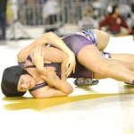 Michael Dashiell/Olympic Peninsula News Group Sequim&rsquo;s Alma Mendoza, bottom, won her 155-pound match with a third-period reversal to defeat Pasco&rsquo; Natalie Hall at Mat Classic, the state wrestling championships. Mendoza wrestled for the state title Saturday evening.