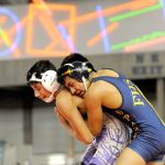 Lonnie Archibald/for Peninsula Daily News Forks&rsquo; Josue Lucas, right, defeats Johnathan Magana of Connell on Saturday to take first in the 106-pound 1A class at the Mat Classic XXIX.