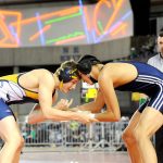 Lonnie Archibald/for Peninsula Daily News Jack Dahlgren of Forks (left) defeated Mike Garrison of Kings Way Christian then moved on to take second in the 195-pound class.