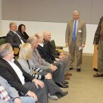Olympic Medical Center CEO Eric Lewis, standing left, and OMC Foundation President Jim Jones, standing right, thanked several donors and sponsors for their support at the Feb. 15 hospital commissioner&rsquo;s meeting. Seated in the front row, from left, are Bill Hermann of Hermann Brothers Logging; Larry Hueth, First Federal; Mary and Todd Irwin, Irwin Dental; Dan Wilder Jr., Wilder Auto Group; and Bill Littlejohn of Littlejohn Companies.