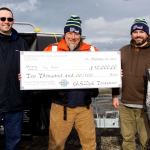 Dave Logan/for Peninsula Daily News The top three winners in the 2017 Olympic Peninsula Salmon Derby are, from left, Derek Madison of Port Angeles, third, (14.85 pounds), Tony Beam of Hansville, first, (15.25 pounds) and Ben Power, of Olympia, second (15.10 pounds).