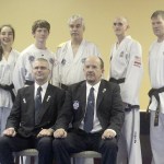 Bodystrong Taekwon-do of Sequim students, back row, from left, Jaden Rego, Trenton Phipps, John Golbeck, Troy Phipps and Larry Muckley recently completed black belt level testing. Front row, Bodystrong instructor Brandon Stoppani and examiner Master David Mason.