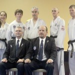 Bodystrong Taekwon-do of Sequim students, back row, from left, Jaden Rego, Trenton Phipps, John Golbeck, Troy Phipps and Larry Muckley completed black belt level testing. Front row, instructor Brandon Stoppani and examiner Master David Mason.