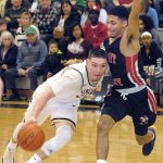 Keith Thorpe/Peninsula Daily News                                Peninsula&rsquo;s Cole Rabedeaux, left, drives as Skagit Valley&rsquo;s Tyler Kidd defends during the Pirates&rsquo; 89-87 NWAC North Division loss to the Cardinals.