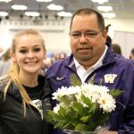 Port Angeles gymnast Laura Rooney and Port Angeles High School Athletic Director Dwayne Johnson at the WIAA 2A/3A State Gymnastics meet at the Tacoma Dome earlier this month.