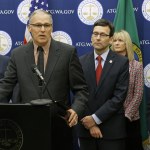 In this Jan. 16, 2017, photo, Washington Gov. Jay Inslee, second from left, speaks during a news conference at the Capitol in Olympia to announce that he and Attorney General Bob Ferguson, third from left, have proposed legislation to abolish the death penalty in Washington state. (Ted S. Warren/The Associated Press)