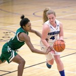 Steve Mullensky/for Peninsula Daily News Vashon&rsquo;s Kristi Walker tries to dislodge the ball away from Chimacum&rsquo;s Mechelle Nisbet during a West Central District 3 pigtail playoff game in Chimacum on Friday.